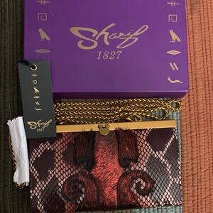 Sharif Red and Brown Clutch with Gold Chain